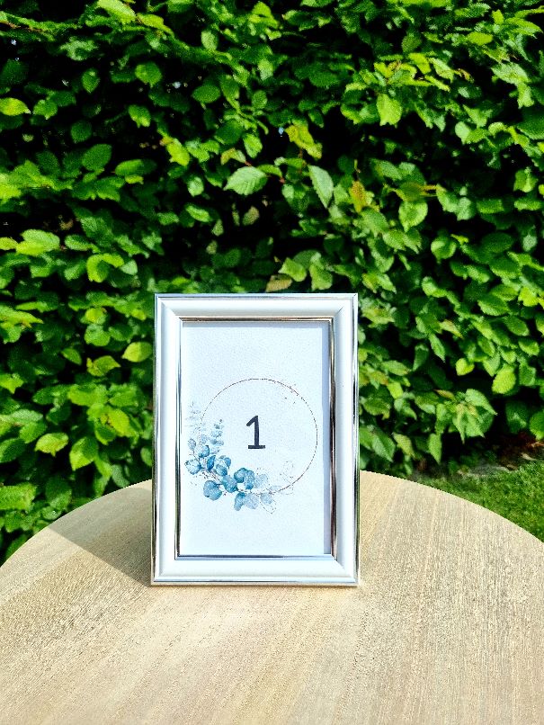 Tischnummer im Bilderrahmen